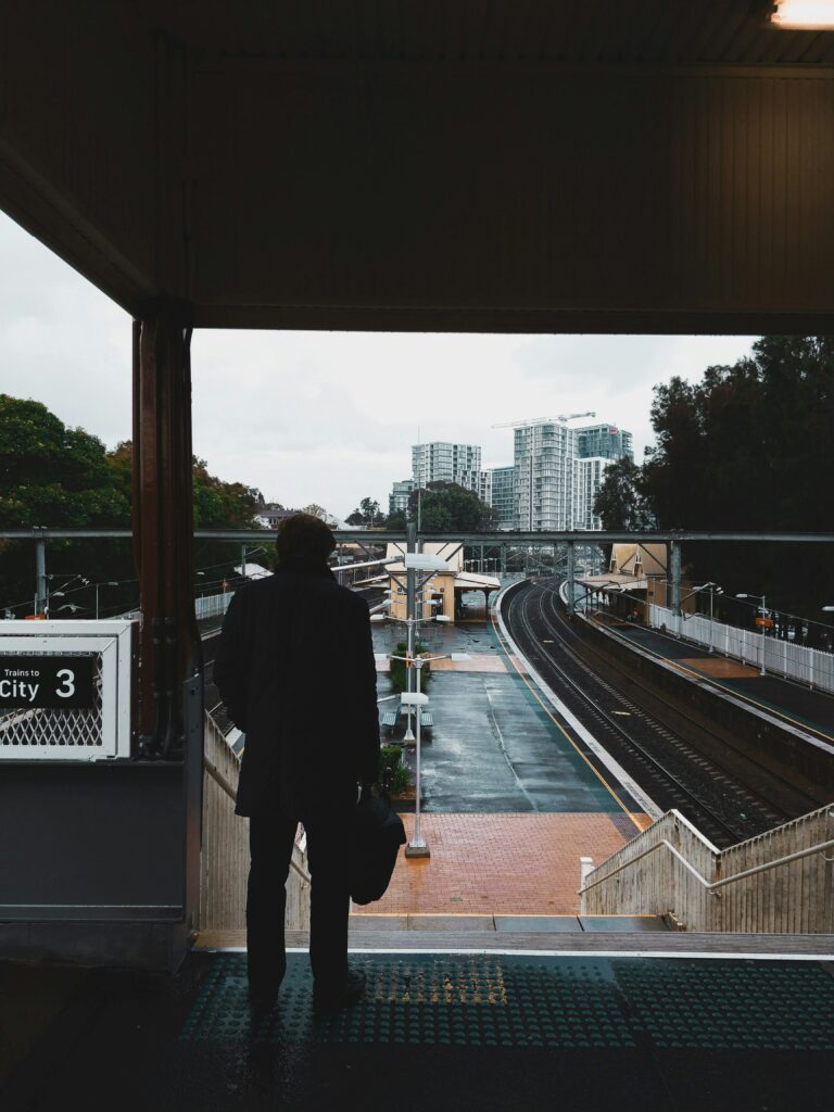 Man standing at train station
